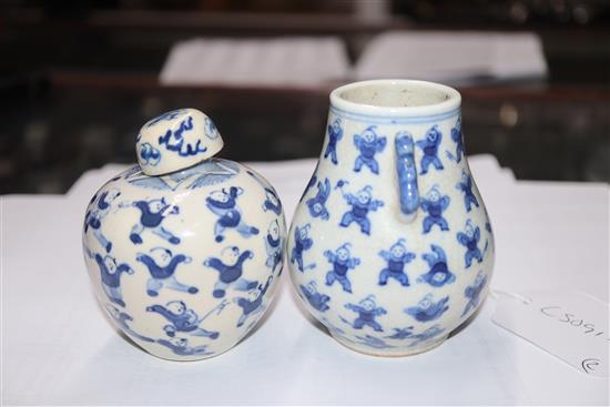 Two Chinese blue and white hundred boys vases, larger 8cm.